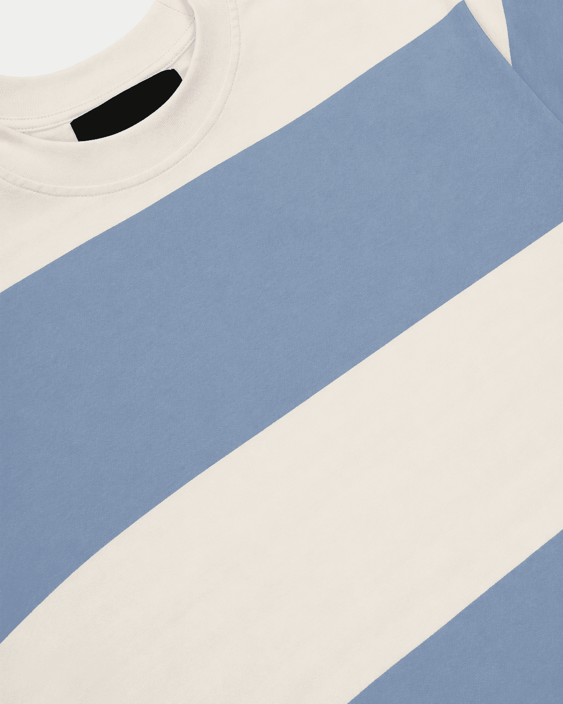 Close-up of a sweater with blue and beige color block design